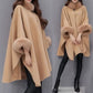 Élégant manteau poncho à col en fausse fourrure de couleur unie