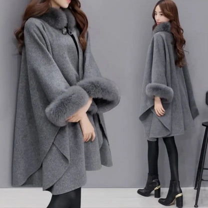 Élégant manteau poncho à col en fausse fourrure de couleur unie