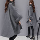 Élégant manteau poncho à col en fausse fourrure de couleur unie
